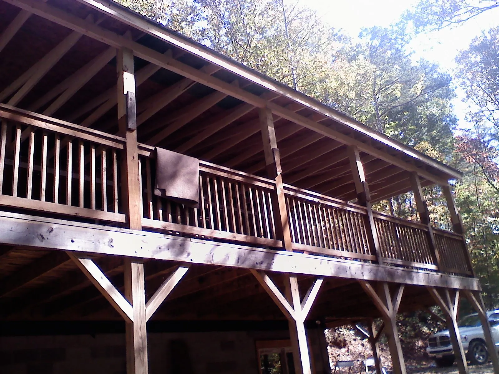 Timber framing under a new elevated porch and deck — Roof Leak Repair in Bowlus by Roofing Brothers